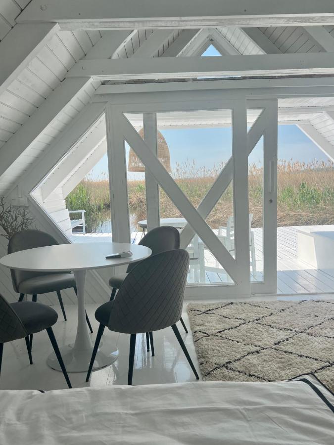 רוסט Seehuette Neusiedlersee - Strandhaus, Elektroboot Inklusive מראה חיצוני תמונה